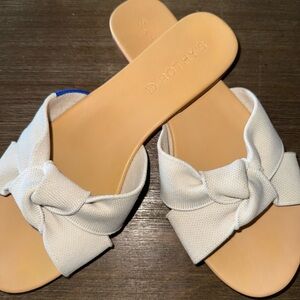 Rothy's The Knot Slide Sandals in a white colorway